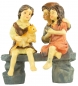 Preview: Handbemalte Krippenfigur Kinder auf einer Bank, ca. 7 cm, K 134-3